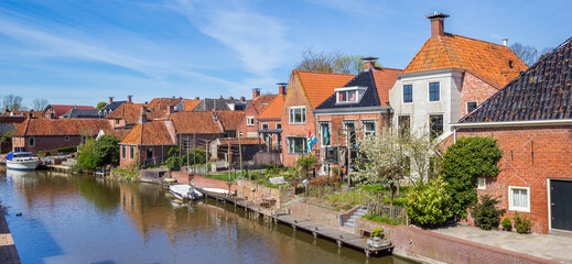Panorama of the historic houses at the river in Winsum, Netherlands