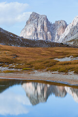the nature, the lake and the panorama inside the Natural Park "Tre Cime - Dolomiti di Sesto" during the autumn season, near the town of Auronzo di Cadore, Italy - October 2021.
