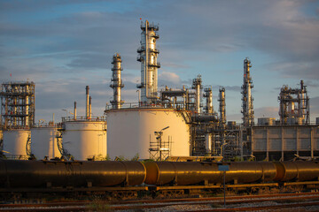 Scene of tank oil refinery plant and tower column of  petrochemistry industry  container on train rail way