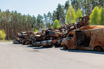 Many shot and destroyed cars at the car graveyard in Irpin, Ukraine.