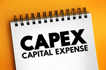 CAPEX Capital Expense - money an organization or corporate entity spends to buy, maintain, or improve its fixed assets, acronym text on notepad - obrazy, fototapety, plakaty