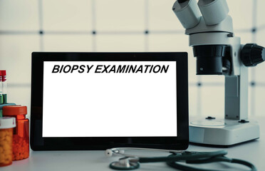 Medical tests and diagnostic procedures concept. Text on display in lab Biopsy Examination