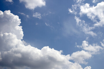 Obraz na płótnie Canvas white clouds and blue sky background