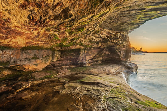 Autumn landscape near sunset of the interior of a sea cave, Paradise Point, Lake Superior, Michigan's Upper Peninsula, USA