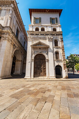 Fototapeta premium Brescia downtown. Close-up of the ancient Loggia Palace (Palazzo della Loggia) in Renaissance Style, 1492-1574, in Loggia town square (Piazza della Loggia). Lombardy, Italy, Southern Europe.