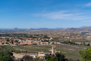 Obraz premium Spanish countryside and old church from village of Busot Spain historic pueblo near El Campello and Alicante