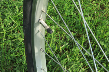 Bicycle wheel rim and valve for pumping air