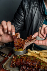 pork ribs with barbecue and potatoes ready to eat