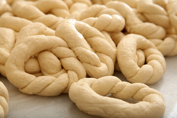 Making Turkish sesame bagels. Simit