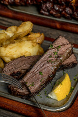 smoked meat and potatoes ready to eat