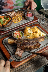 smoked meat and potatoes ready to eat