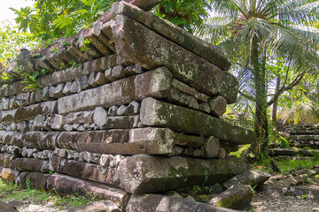 Close up of a stone wall of Nan Madol, Federated States of Micronesia - obrazy, fototapety, plakaty