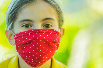 Little girl with mask