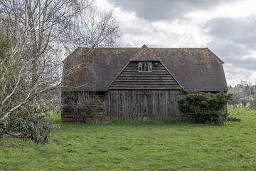 Fototapeta premium Old black wooden barn