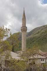 Fototapeta na wymiar Tall minuet against a cloudy sky in Bosnia Herezgovina