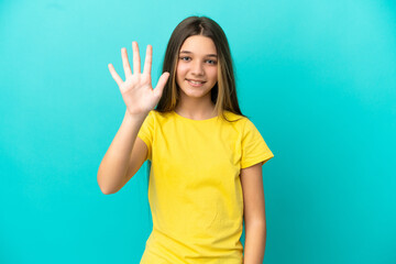 Fototapeta premium Little girl over isolated blue background counting five with fingers