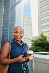 A young Black businesswoman arrives at the office with coffee and smile