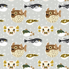 Seamless pattern with cute cartoon blowfishes © Radiocat