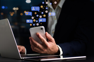 The notion of social media and digital internet, A guy uses his smartphone to access social media. The notion of work and play, as well as social media play Work from home idea, social distance