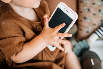 Mobile phone in children's hands