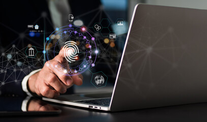 A businessman scans his fingerprint using a mobile banking software and a future technological interface.Concept of digital banking, personal financial data safety, Internet payment, online marketing.