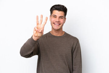 Fototapeta premium Young handsome caucasian man isolated on white bakcground happy and counting three with fingers