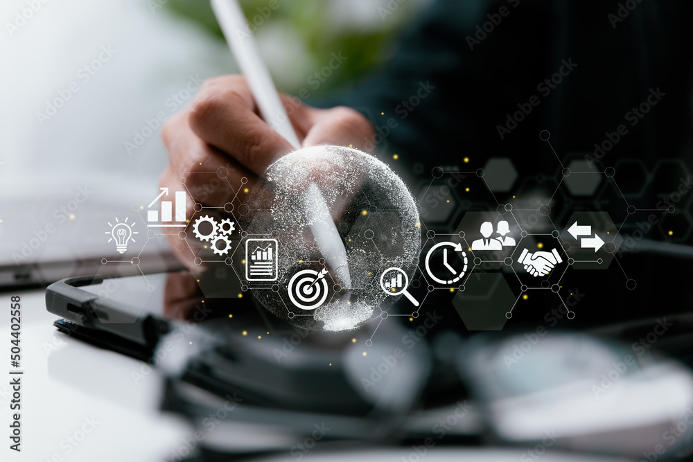 Leinwandbilder a businessman uses his tablet. examples of business worldwide internet connection application techno
