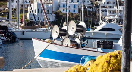 Fishing boat anchored at Kythnos island harbor. Greece, Cyclades. Summer holiday © Rawf8