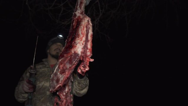 Hunter Field Dressing Deer At Night Using An Electric Saw