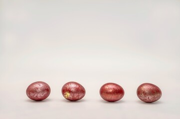 Obraz premium Easter traditional on the religious holiday of Easter eve, four beautiful red chicken eggs , hand made painted in different colours, 