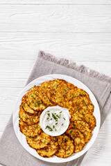spelt flour pancakes on white plate, top view