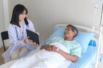 Fototapeta premium Asian senior male patient is consulting and visiting doctor in hospital....