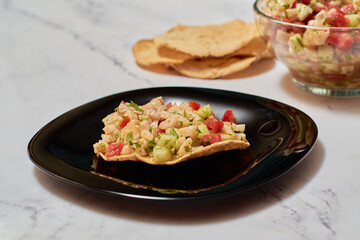 Fresh dish from Mexico and Peru, Ceviche Tostada.