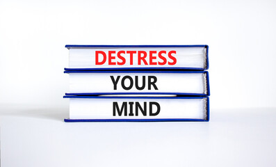 Destress your mind symbol. Concept words Destress your mind on books. Beautiful white table white...