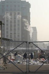 People working at the rubbish dump