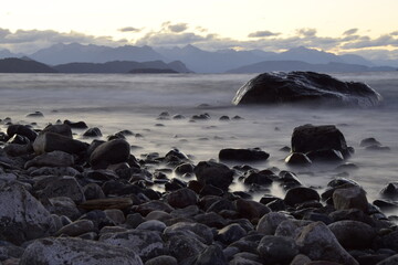 rocky shore of the Beautiful lakes in argentinian Lake District near Bariloche, Argentina