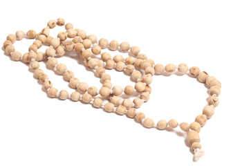 Rosary or prayer beads isolated on white background