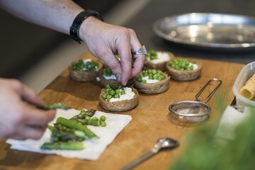 Preparing dinner. Food. Table, close-up, dining, background, lighting, people. Adventure restaurant.