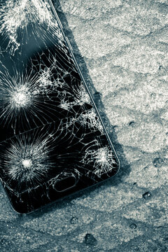 Smart phone with broken screen.