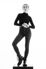 beautiful young woman posing on white background