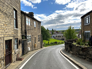 View down, Thackley Old Road, with old cottages, fields, and Shipley in the distance in, Bradford, UK