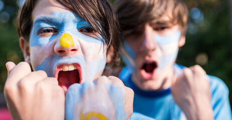 Brothers cheering and shouting Argentina's goals in the World Cup. Qatar 2022.
