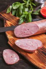 Still life with homemade duck sausage, boiled and smoked