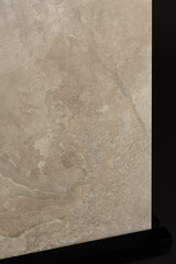 Porcelain tiles with a stone texture on a dark gray background