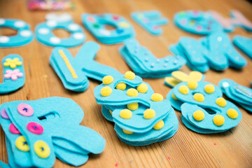 Hand made felt alphabet letters with decorations. DIY ideas for creative and inventive mothers.