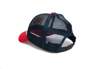 A navy blue, red, white baseball cap, isolated on white background.