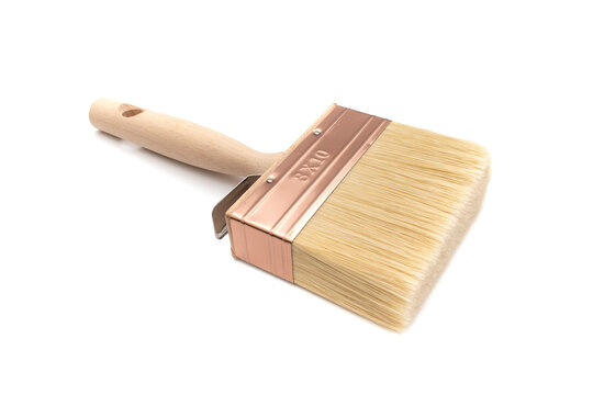Canarian paletina brush N&ordm;3x10, with white and blonde synthetic bristles and varnished wooden handle. Suitable for any type of paint, including glues and adhesives. Isolated on white background.