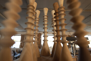 Wooden craft products in workshop arranged in workshop, copy space