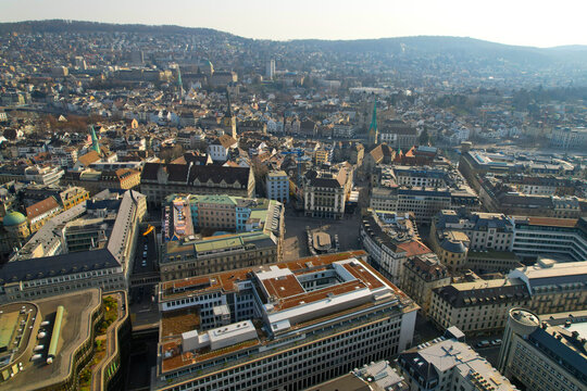 Aerial view of City of Z&uuml;rich with famous Parade Square (Paradeplatz) on a blue cloudy spring day. Photo taken March 21st, 2022, Zurich, Switzerland.