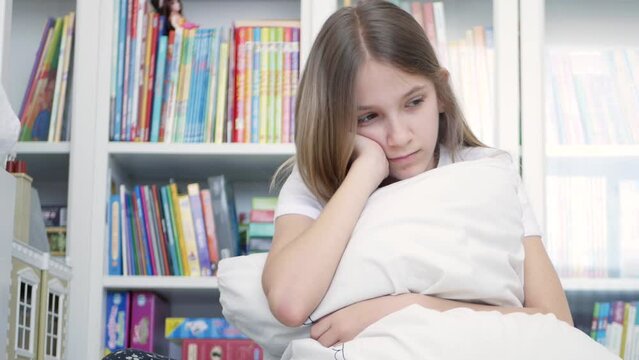 Sad Kid, Unhappy Child, Sick Ill Teenager Girl in Depression, Stressed Thoughtful Bullied Person Affected by Coronavirus Pandemic